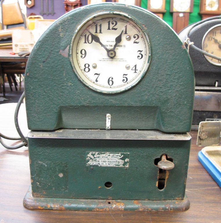 Electric Time Recorder Clock by Latham: Electric Time Recorder Clock by Latham, appears to run and punch, dial is marked "Latham Time Recorder Co.", H. 12-3/4", W. 11", death 7-1/4", Dial 4-3/4"