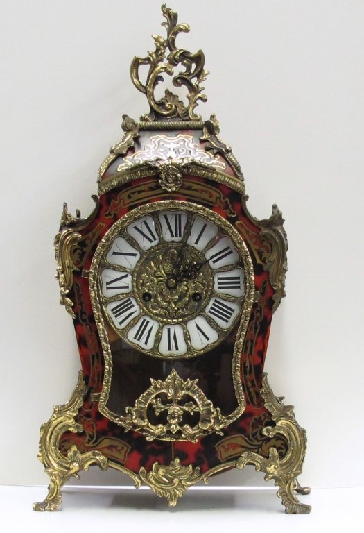 Ornamental German Inlaid Ormolu Mantel Clock: Ornamental German Inlaid Ormolu Mantel Clock, running, chiming, very ornate, H. 23", W. 12-1/4", D. 5-3/4", Dial 7"