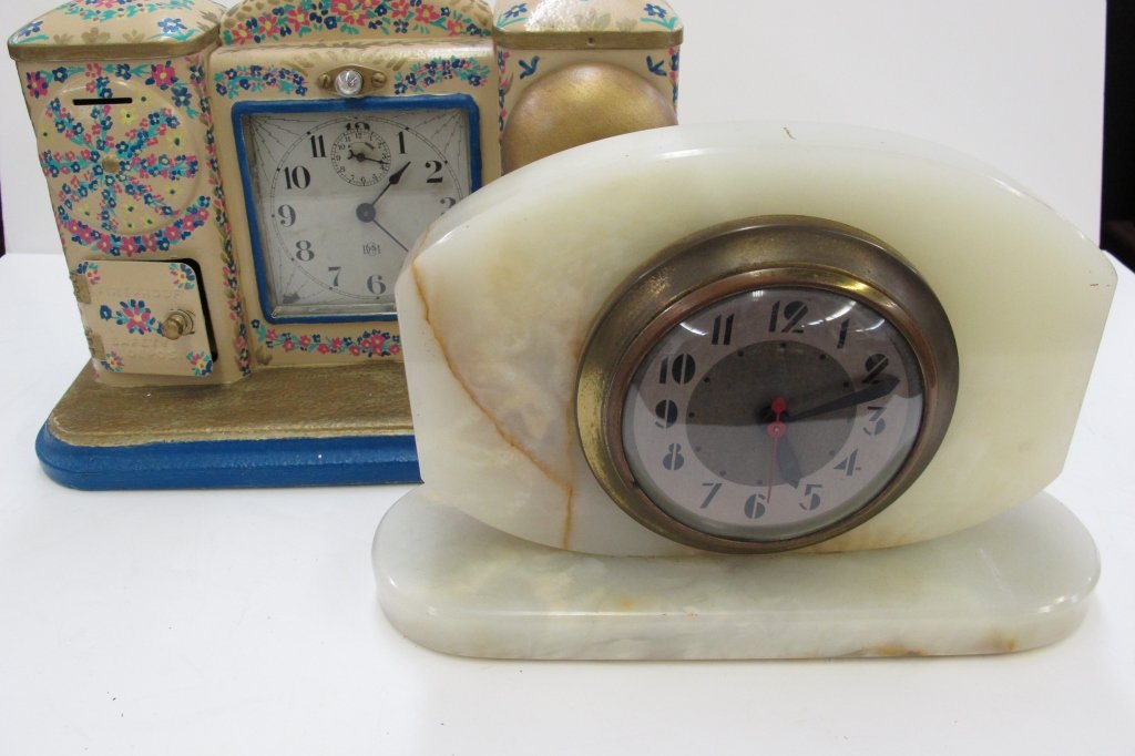 2 Desk Clocks, Windup, Electric: 2 Desk Clocks, Windup, Electric, backspace: Novelty Painted Desk Clock with safe, alarm and light by D M Co., running, H. 8", W. 11-3/4", D. 5-1/2"; Electric Desk Clock, marble or quartz body, running