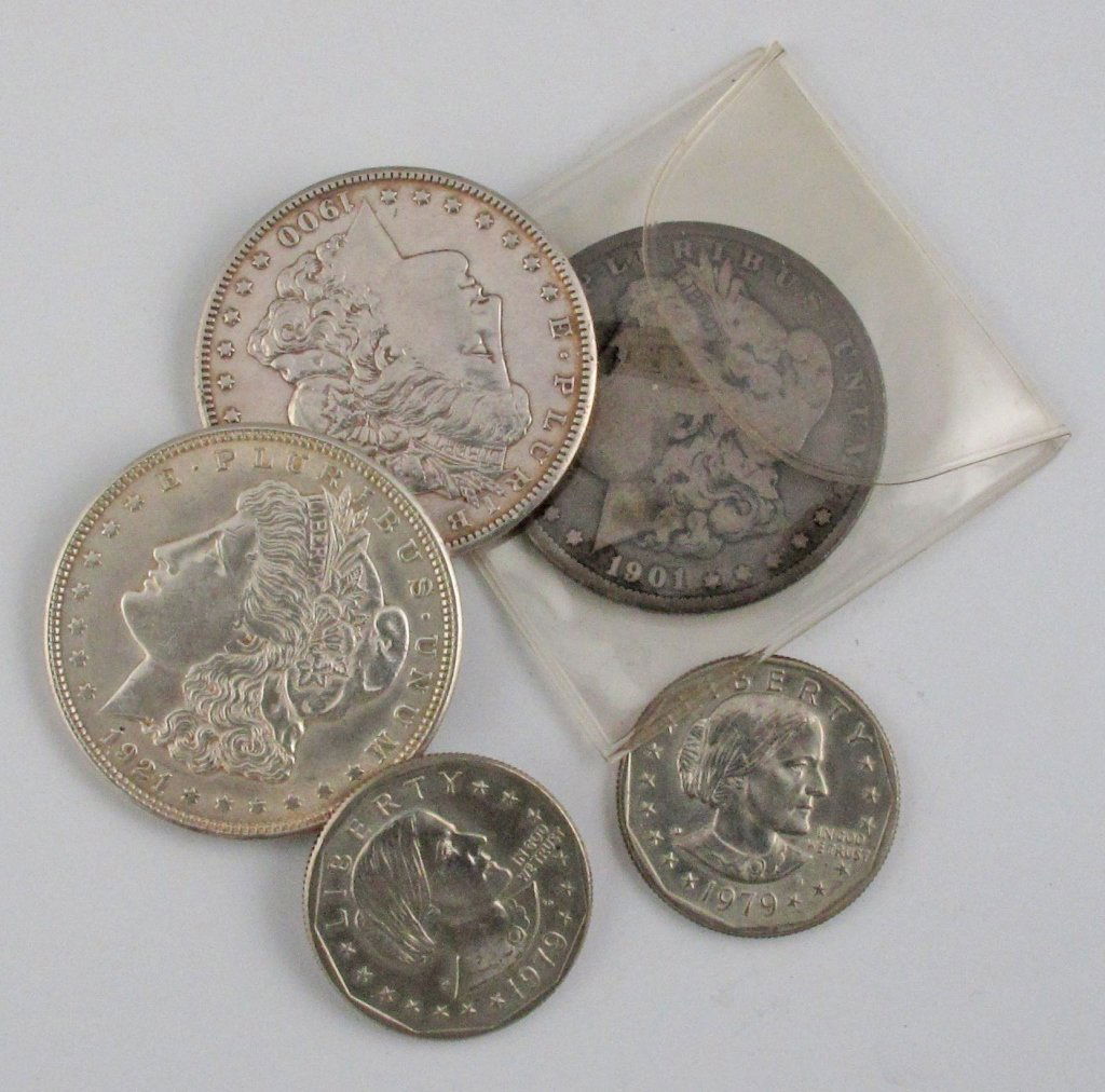 Five US 1 Dollar Coins: Five US 1 Dollar Coins, one 1901 Morgan worn, one 1900 Morgan nice, one 1921 Morgan nice condition, two 1979 Susan B. Anthony