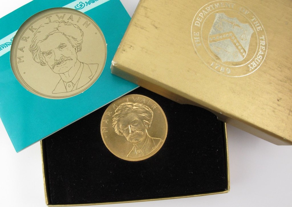 One 1981 American Arts Commemorative .5 oz Gold: One 1981 American Arts Commemorative half-ounce gold medallion in original box, Mark Twain Commemorative