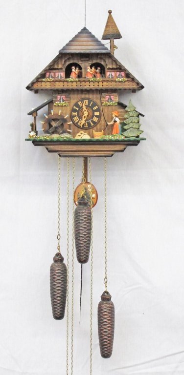 German Black Forest Musical Cuckoo Clock, 8-day: German Black Forest Musical Cuckoo Clock, 8-day, H. 15", Music plays and figures move on the hour, cuckoo on the half-hour and hour, Cert. of Authenticity from Association of Black Forest Clock (VDS)