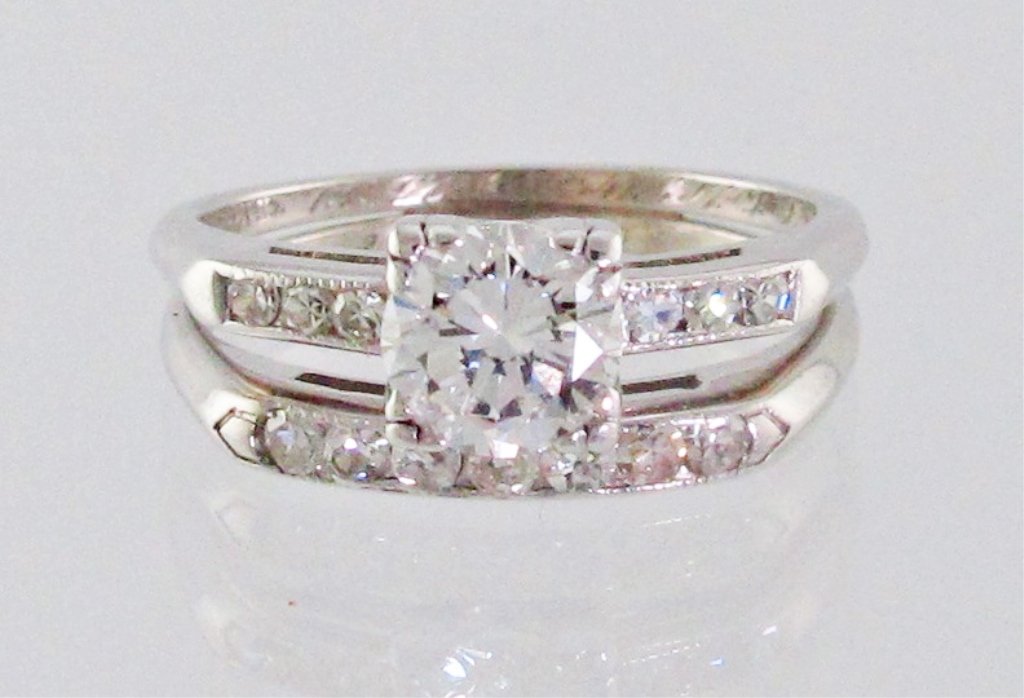 1 Ct. Platinum Diamond Wedding Ring Set: Lady's Soldered Wedding/Engagment Ring Set, round brilliant cut diamond approx. 0.68 cts., VS-1 clarity, G color, single cut side diamonds total approx. 0.20 cts., platinum, 3.1 dwt, ring size 5