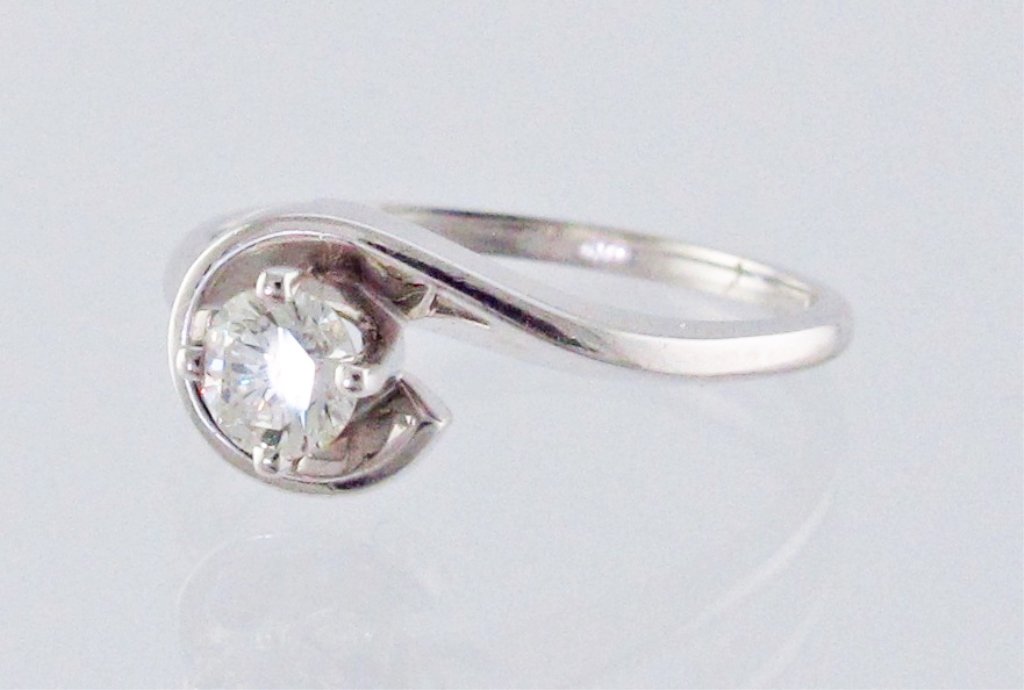 14K White Gold Solitaire Diamond Ring: Lady's Solitaire Diamond Ring, round brilliant diamond weighs approx. 0.33 cts., VS-1 clarity, I color, 14K white gold, 1.5 dwt, ring size 7-1/4