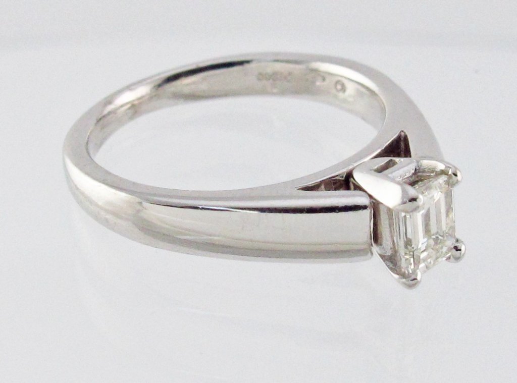 Platinum Solitaire Diamond Ring: Lady's Solitaire Diamond Ring, emerald cut diamond weighs approx. 0.45 cts., VS-1 clarity, I color, platinum, 4.5 dwt, ring size 6