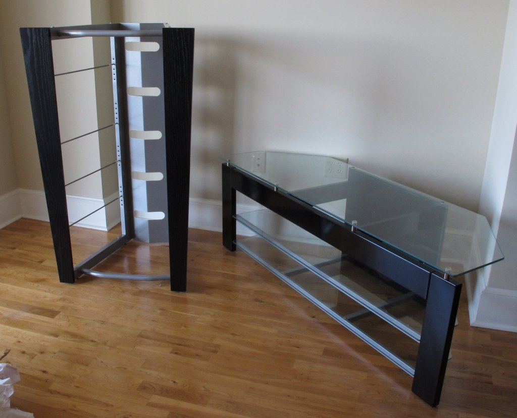 Tiered Glass Television and Stereo Cabinets: 2 Audio/Video Cabinets: Television Stand with 3 shelves, middle shelf is adjustable, H. 20", W. 58", D. 20"; Stereo Cabinet with 6 shelves, all middle shelves are adjustable, H. 46", W. 30", D. 23"