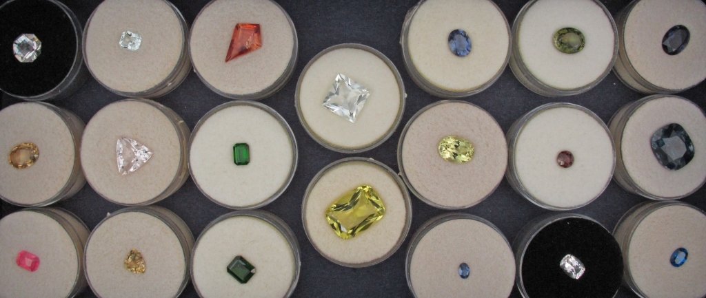 Lot of Assorted Faceted Gemstones: Lot of Assorted Faceted Gemstones, 20 pieces, various colors, cuts, and minerals, including iolite, sillimanite, diopside, benitoite, others