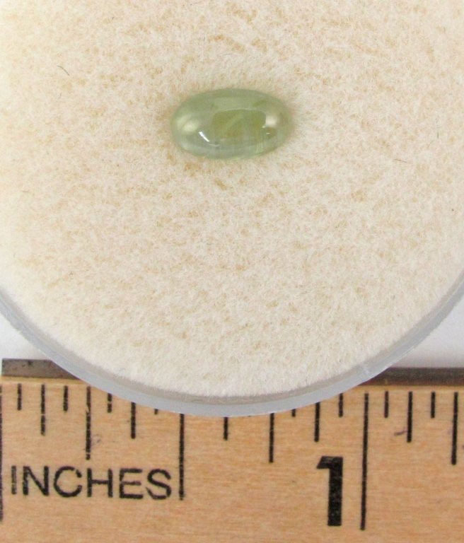Oval Cabochon Cat's Eye Chrysoberyl: Oval Cabochon Cat's Eye Chrysoberyl 1.05 Cts., 6x4mm