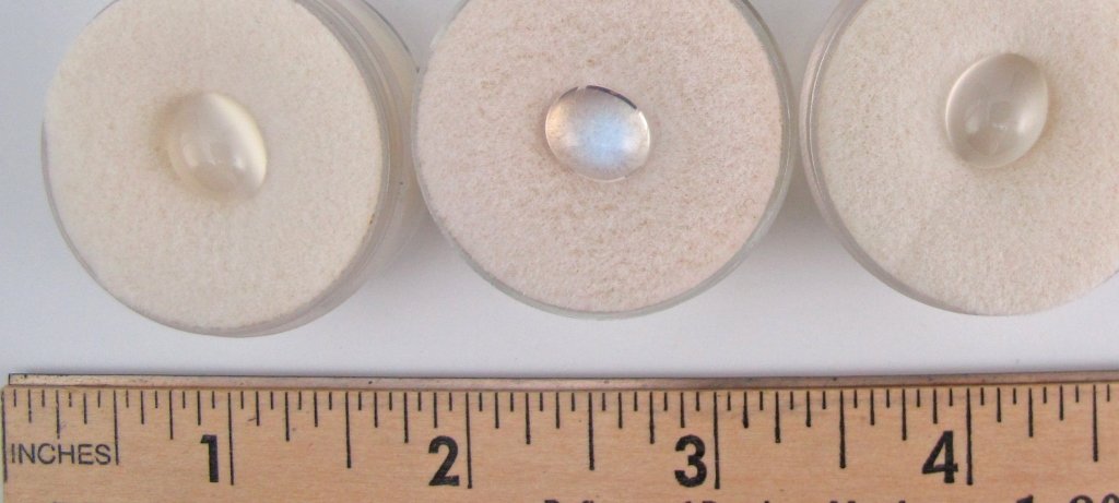 3 Cabochon Moonstones: 3 Cabochon Moonstones totaling 10.83 cts., one from Sri Lanka