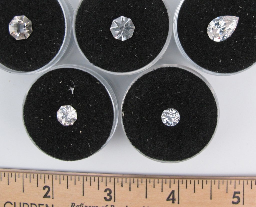Five Faceted Colorless Zircon Gemstones: Five Faceted Colorless Zircon Gemstones totaling 11.88 cts.