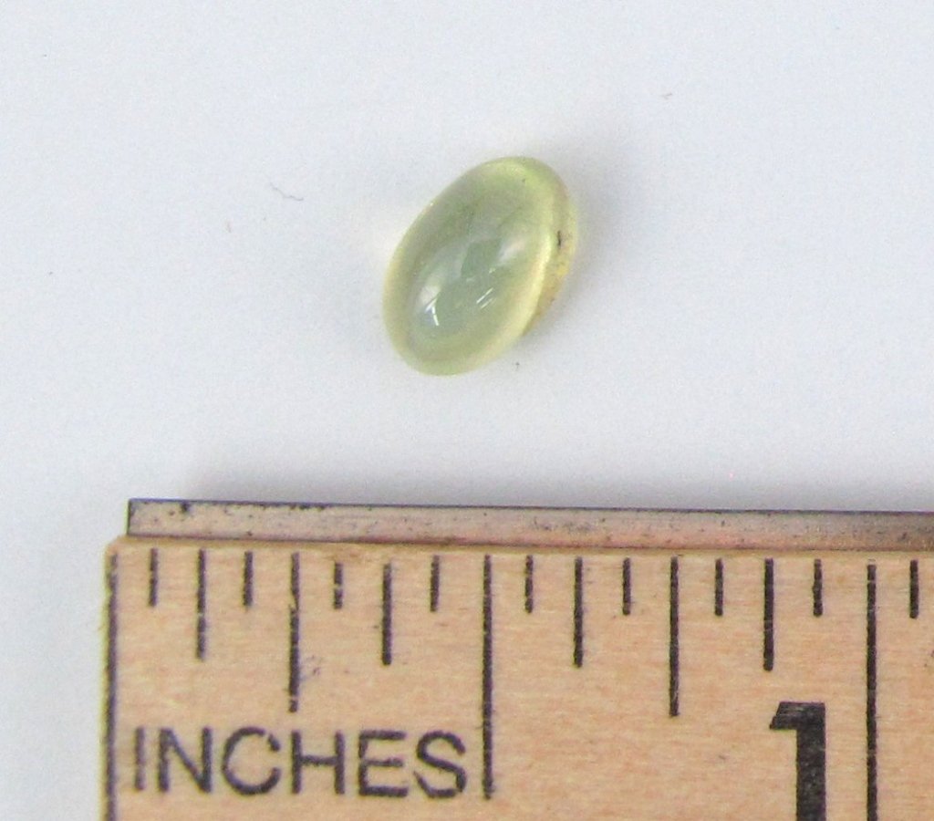 Oval Cabochon Cat's Eye Chrysoberyl: Oval Cabochon Cat's Eye Chrysoberyl 1.76 Cts.
