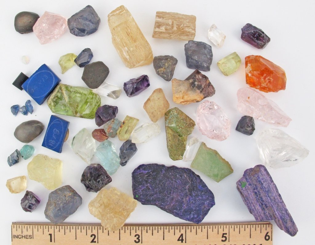 Assorted Lot of Rough Uncut Semi-Precious Gems: Assorted Lot of Rough Uncut Semi-Precious Gems, includes axinite, iolite, amethyst, scapolite, others