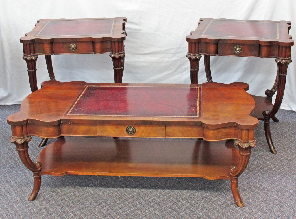 3 Matching English Regency Leather-top tables: 3 Matching English Regency Leather-top tables, tooled and gilded leather tops, highly decorative apron which follows the scallop of table top, cabriole legs with open lower shelf, drawer, side tables