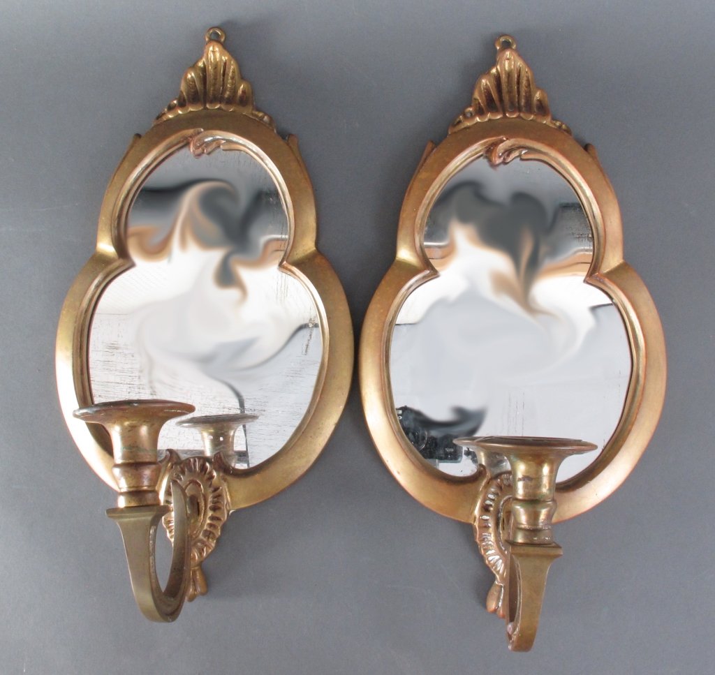 Pair of Mirrored Brass Wall Sconces: Pair of Mirrored Brass Wall Sconces, single candle holder, H. 16", W. 8-1/4", hand-cut mirrors are showing some deterioration.