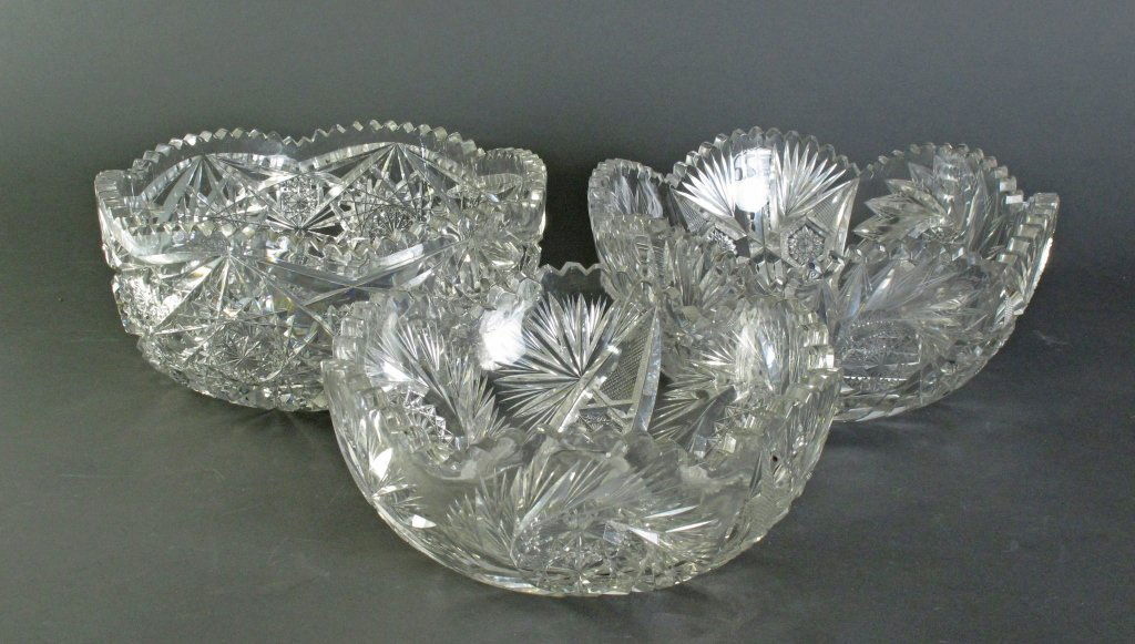 3 Cut Glass Bowls, Serving Size: 3 Cut Glass Bowls: Bowl with deeply scalloped edge, pinwheel design with finely checkered areas, Dia. 9", a few rim chips; Bowl with scalloped edge, Dia. 8-7/8", square / diamond pattern, few very lig