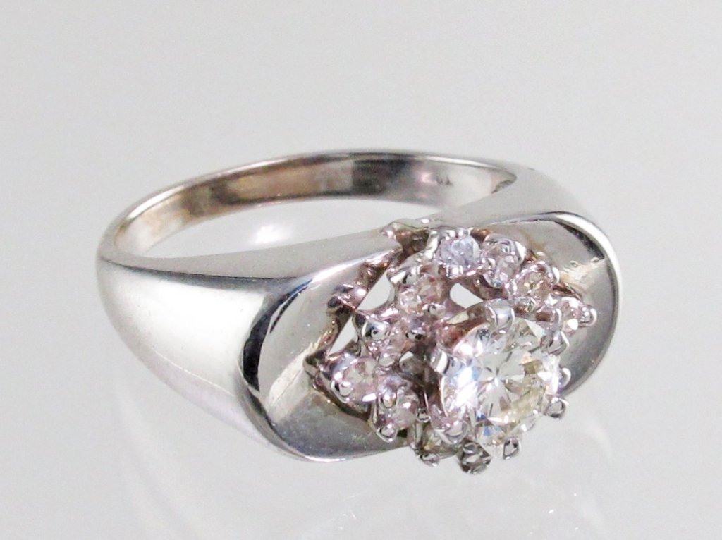 1/2 Ct. Diamond Ring 14K White Gold: Lady's White 14 Karat Diamond Ring With Center 0.42Ct Round Brilliant Cut L Si2 Diamond surrounded by smaller Diamonds, total diamond weight is approx. 0.54 cts., ring size 6-1/2, 3.6 dwt