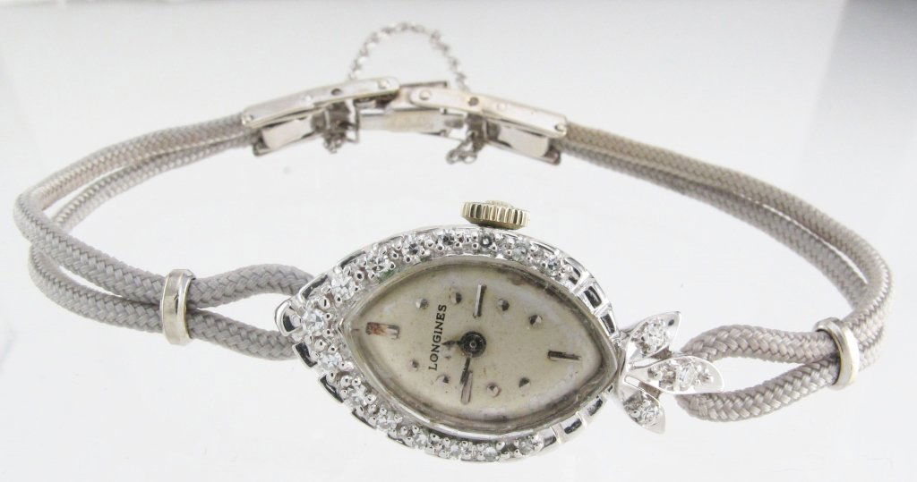 Longines 14K White Gold Diamond Wrist Watch: Lady's Longines White 14 Karat Watch With 0.20 cts. Round Diamonds, running now, no guarantee that this will run after being shipped