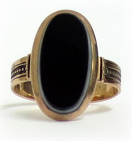 10K Rose Gold Solitaire Black on White Onyx Ring: Lady's RosÃ© 10 Karat Ring With One Black on White Onyx oval tablet measuring approx. 15x7mm, ring size 4-3/4, 2 dwt