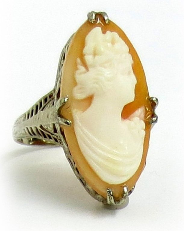 14K Cameo Ring: Lady's White 14 Karat Ring With Oval Shell Cameo measuring approx. 20x10mm, ring size 6, 2 dwt