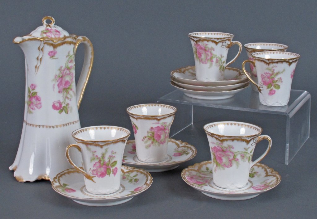 Haviland Limoges Chocolate Set 19th-early 20th C: Haviland Limoges Chocolate Set for 6, Delicate Hand Painted Pink Tea Rose pattern with Gold Gilding: Covered Pot, H. 8-3/4", fluted edges top and bottom; 6-Coffee / Tea Cups with Saucers, H. 3" (cups)