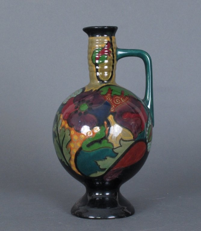 PZH Gouda Art Pottery 1923 Hand Painted Ewer: Gouda Art Pottery 1923 Hand Painted Ewer, H. 9", one chip on side of rim and a few small chips on bottom, impressed marks, hand-painted PZH factory artist marks, Gouda, Holland