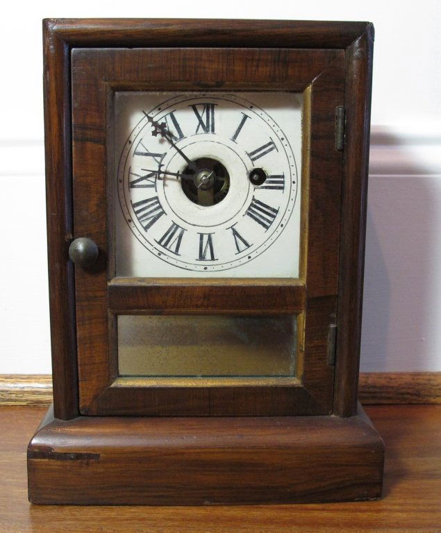 C1865 Seth Thomas Shelf Clock: C1865 Seth Thomas Shelf Clock- Thomaston CT. Rosewood case, painted dial H.10" W.7" D.4"