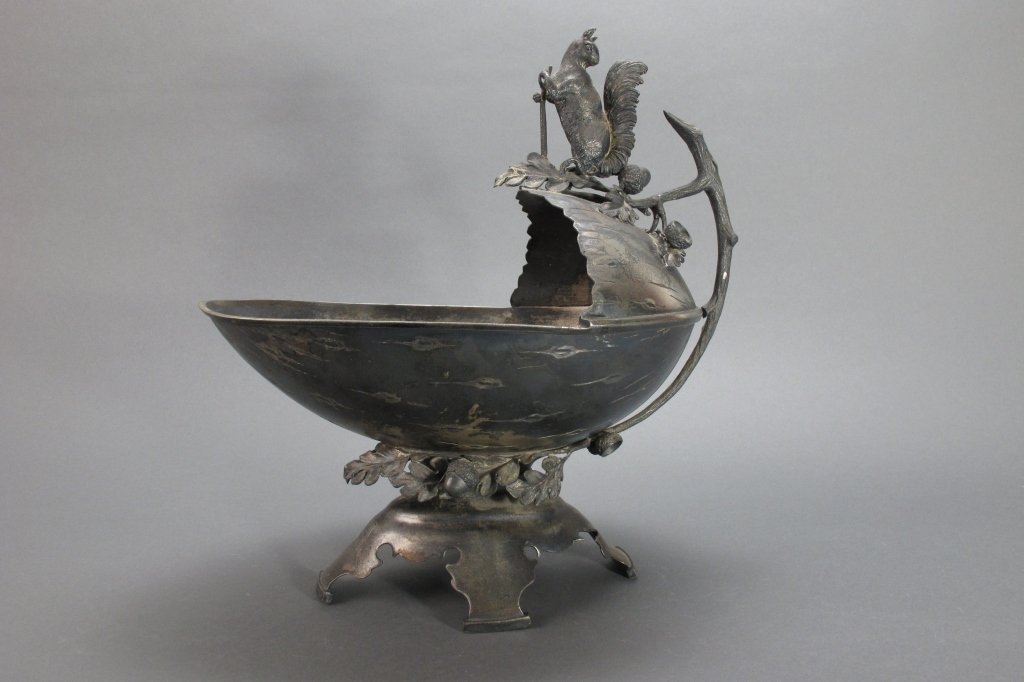 Late 19th C Figural Nut Bowl by Middletown Plate C: American Silverplate Figural Nut Bowl, Middletown Plate Co., Middletown, CT, 1864-1899, three-quarter nut-form bowl adorned with oak branches and acorns and a squirrel seated atop a branch-form handle