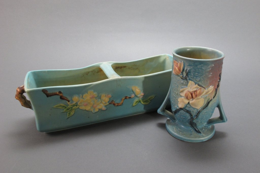 2 Pcs Roseville, Apple Blossom, Magnolia: 2 Pcs Roseville, Apple Blossom, Magnolia: Blue Apple Blossom Window Box Planter, 369-12, hairline and crazing, small amount of overpaint on one handle; Blue Magnolia Vase, 87-6, some crazing with no c