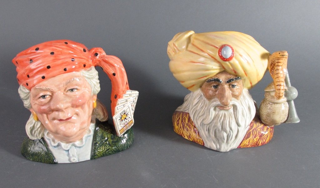 2 Royal Doulton Character Mugs/Toby Jugs: 2 Royal Doulton Character Mugs/Toby Jugs: The Snake Charmer, D. 6912, H.7-1/4"; The Fortune Teller, D. 6874, H.7"