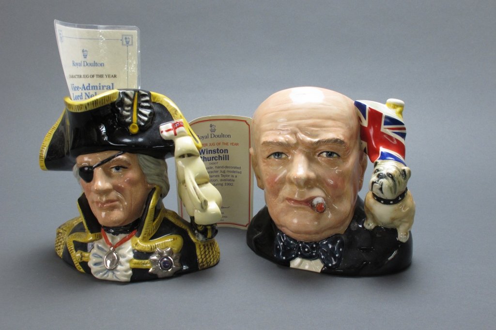 2 Royal Doulton Character Mugs/Toby Jugs: 2 Royal Doulton Character Mugs/Toby Jugs: Signed Vice Admiral Lord Nelson, signed by Michael Doulton, D. 6932, H.6-1/2"; Winston Churchill, D. 6907, H.7"