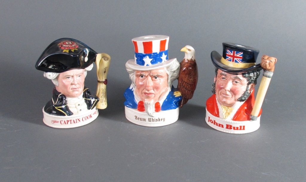 3 Small Royal Doulton Jim Beam Whiskey figures: 3 Small Royal Doulton Jim Beam Whiskey figures: Uncle Sam, H. 5-1/2"; John Bull, H. 5-1/2"; Captain Cook, H. 5"