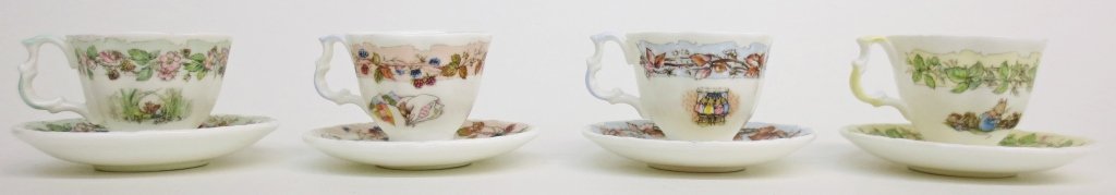 4 Royal Doulton Miniture Cups and Saucers, Beatrix: 4 Royal Doulton Miniture Beatrix Potter 4 Seasons Cups, matching saucers, Spring, Summer, Autumn and Winter, H. 2-1/2"