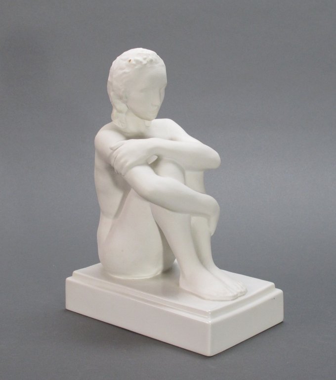 KPM Bisque German Porcelain Figurine: KPM Bisque German Porcelain Figurine, nude seated woman with hands wrapped around knees, H. 9-1/4", in good condition with no chips, cracks or repairs