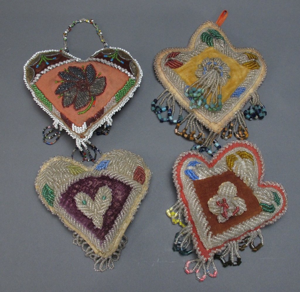 4 Native American Beaded Wall Hanging/Pin Cushions: 4 Native American Beaded Wall Hanging/Pin Cushions, likely Iroquois, approx sizes are W. 6", some beading missing on bottom edge of one cushion (see pictures)
