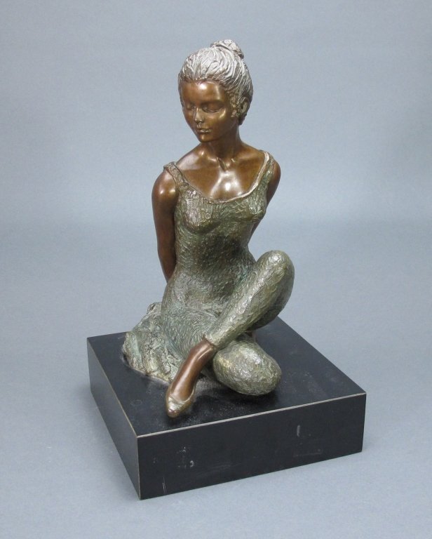 Peggy Mach Bronze Ballerina Sculpture "Interlude": Peggy Mach Bronze Ballerina Sculpture "Interlude", seated, signed and numbered 34/50, patinated bronze on black square base, seated ballerina in stretch position, 1979, H. 12.5" overall