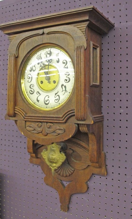 German Wall Clock by Unghans: German Wall Clock by Unghans, J Unghans marked on movement, 32" H x 17" W. ,with pendulum and key