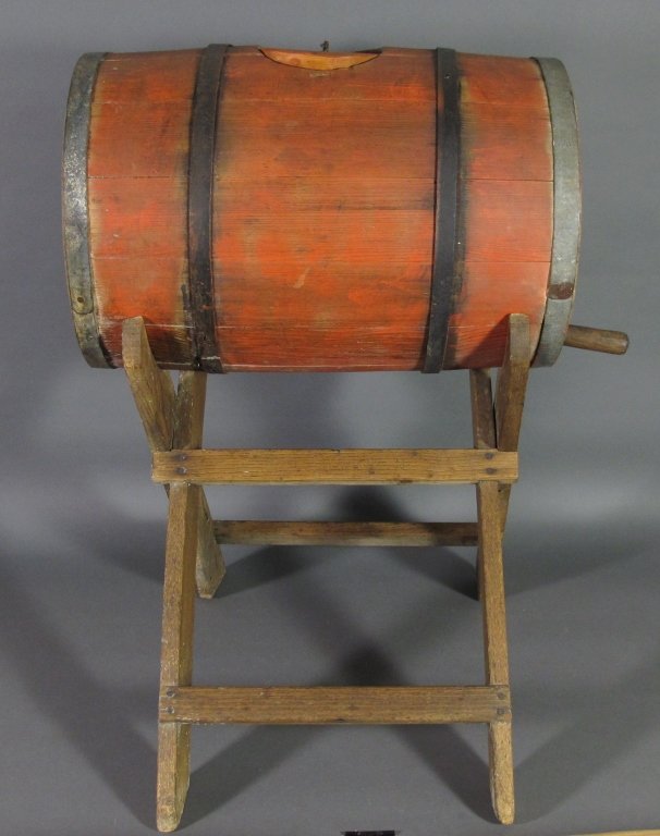 Primitive Wooden Barrel Butter Churn: Primitive Wooden Barrel Butter Churn, on sawbuck-form stand, banded barrel remains stationary while inner paddles churn, working condition, H. 29-1/2", L. 19-1/2"