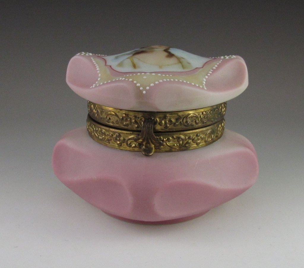 Wavecrest Cameo Pink Powder Dish: Wavecrest Cameo pink powder dish. Enameled painting of Victorian lady on cover. Interior of cover lined. 3 1/2" x 3 1/4" W.4" square base. Wavecrest Flag on bottom.