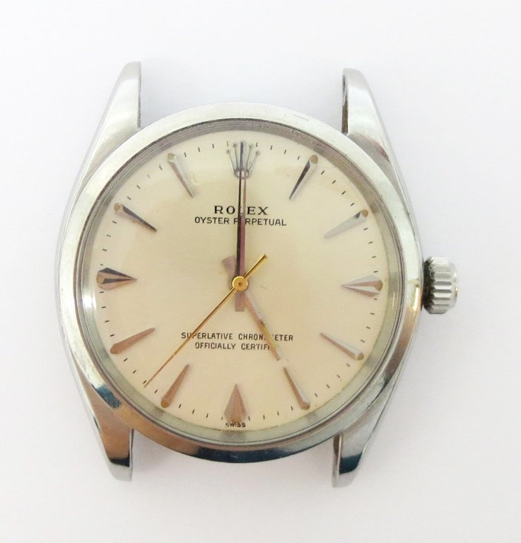 Vintage Rolex Superlative Chronometer Oyster Perp.: Vintage Rolex Superlative Chronometer Oyster Perpetual Watch without wristband, runs, accuracy not guaranteed, 35mm, late 1950's, SN 574990, with original paperwork
