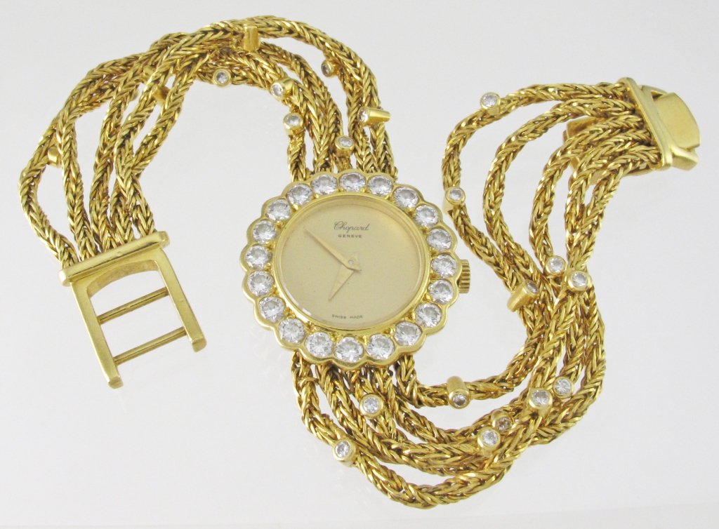 Lady's Yellow 18 Karat Chopard Diamond Watch: Lady's Yellow 18 Karat Chopard Diamond Watch With 2.00Tw Round Brilliant Cut Diamonds, L. 6-3/4", 22mm round dial, 33.95g