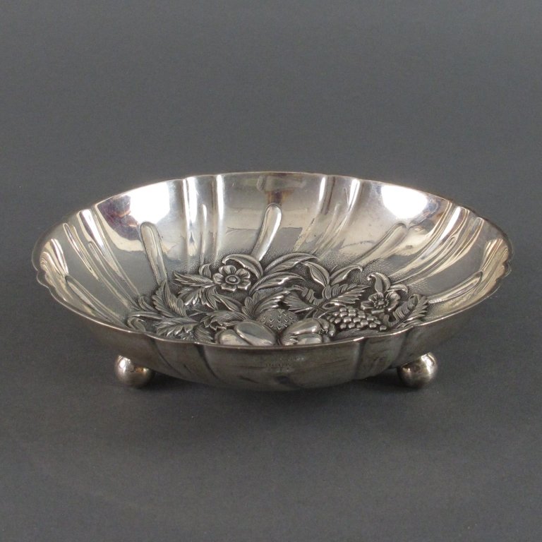 S Kirk & Son Round Repousse Bowl: S Kirk & Son Round Repousse Bowl, raised on ball feet, fruit and floral repousse design, H. 1-1/2", Dia. 5-3/4", pattern 431, 5.14 Toz