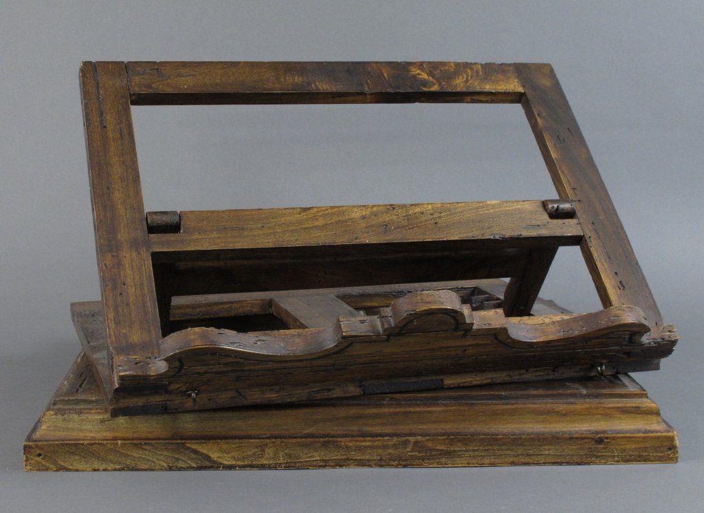 Adjustable/Swivel Wood Book Stand: Adjustable/Swivel Wood Book Stand, marked in Italy, L. 18-3/4', W. 14-1/4", H. 13", will lay flat to a H. of 6-1/2"