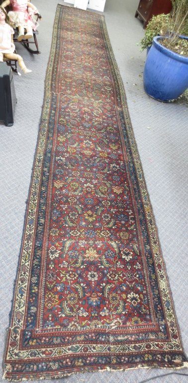 Semi-Antique Asian Rug: Sremi-Antique Asian Rug: Runner, L. 19' 7", W. 35-1/2", worn with repair