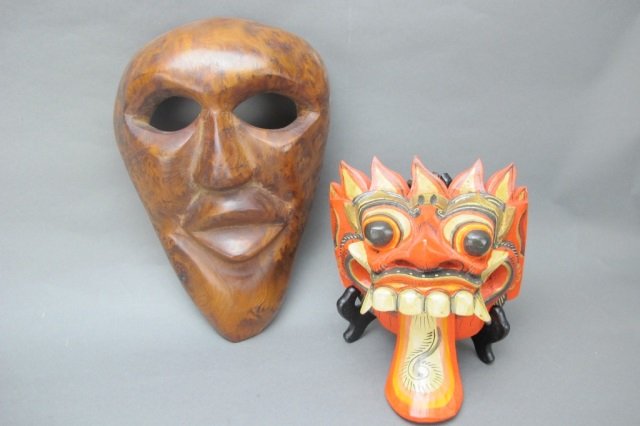 2 Carved Masks: 2 - Carved Masks: African, carved wood, 12 x 7-3/4" ; Indonesian carved and painted wood, 8" x 6-1/2""