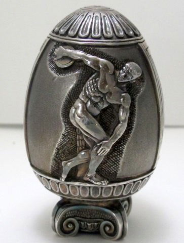 Sterling Silver Egg: Sterling Silver Egg, Made in Greece, on stand featuring discus thrower in 2 positions, H. 3-1/4 Weighted."