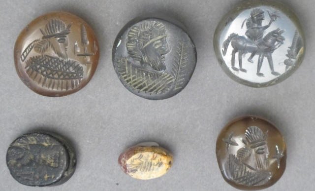 6 Near Eastern Mesopotamian Intaglio stamp seals: Group of 6 Near Eastern Mesopotamian Intaglio stamp seals: Agate, calchedony, and feldspar group of 6. Circa 3000 B.C. Largest is 28 mm.,Lifelong collection from the estate of a gentleman seal collect