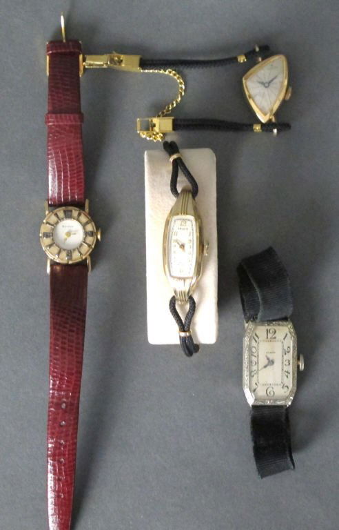 4 Ladies' Wrist Watches Hamilton, Bulova, Gruen, Elgin: Hamilton 10KGF. Bulova 10KRGP (crystal missing). Gruen 14KYGF curvex. Elgin 14KWG ribbon band.