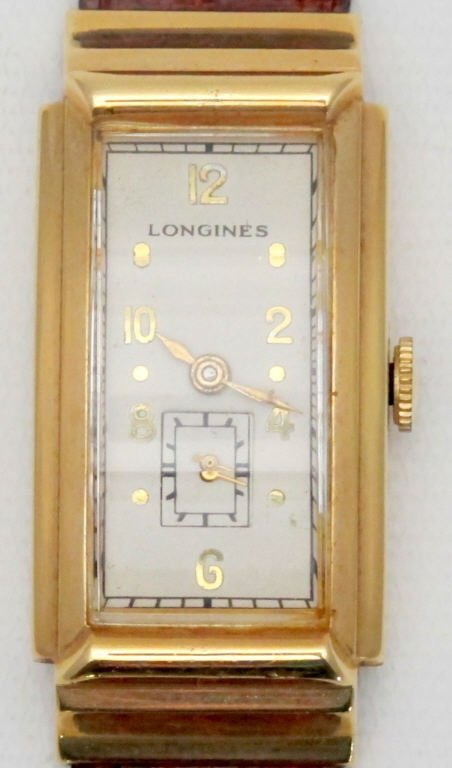 Longines Mechanical Wrist Watch 14K Beveled Crystal: 14KYG. 17J. 9L. 6780895. Beveled crystal. Running