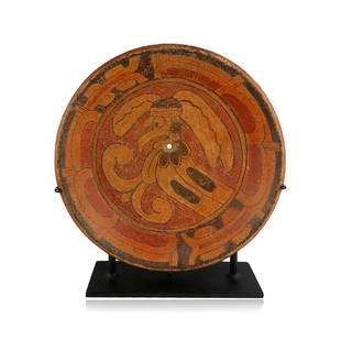 Pre-Columbian Maya Moan Bird Plate: A gorgeous Maya Plate from Mexico, ca. 600-900 A.D. Nicely painted plate depicting a Moan bird in the center. Custom metal stand included. 11-3/8" in diameter.