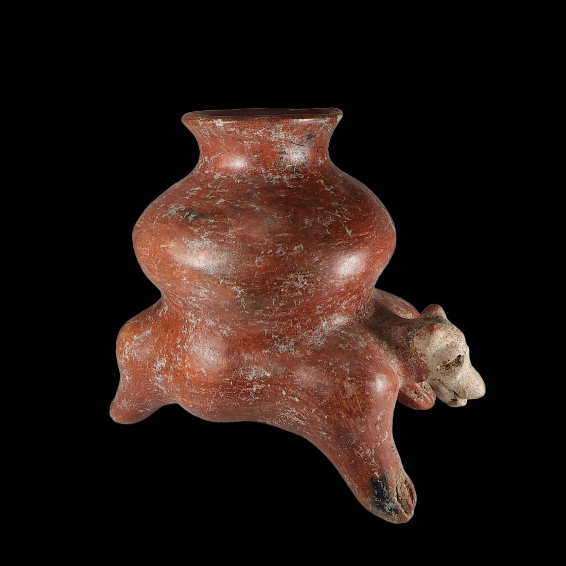 Rare Pre-Columbian Jalisco Dog carrying a olla: Pre-Columbian Jalisco dog from West Mexico, ca. 300 BCE-300 CE. Dog vessel carrying a olla and tongue hanging out of its mouth. A few rim chips otherwise pretty excellent condition. Old collection tag